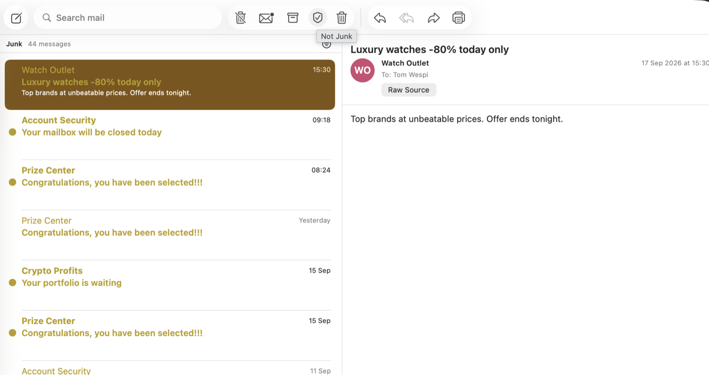 Tom’s Junk folder on the Mac with its rows in ochre and “Luxury watches -80% today only” open, the pointer on Not Junk in the toolbar
